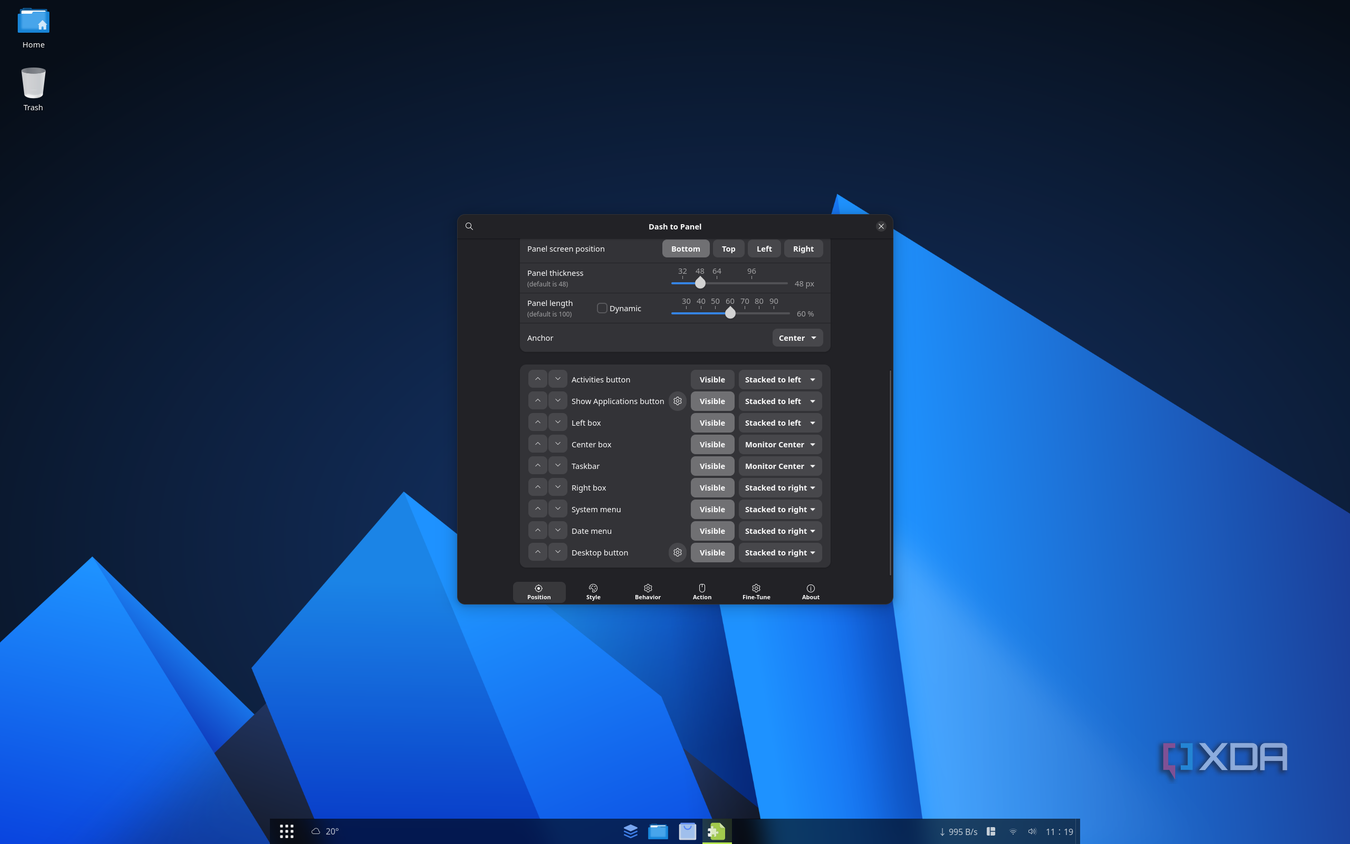 Screenshot of AnduinOS showing settings for the taskbar with a reduced width and an added Applications icon