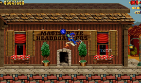 Captain Claw collecting a blue gem in the 1997 game Claw.