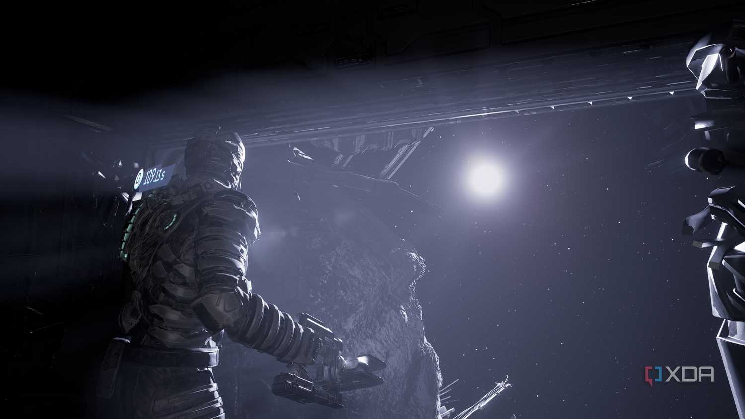Isaac looking at outer space in Dead Space (2023).