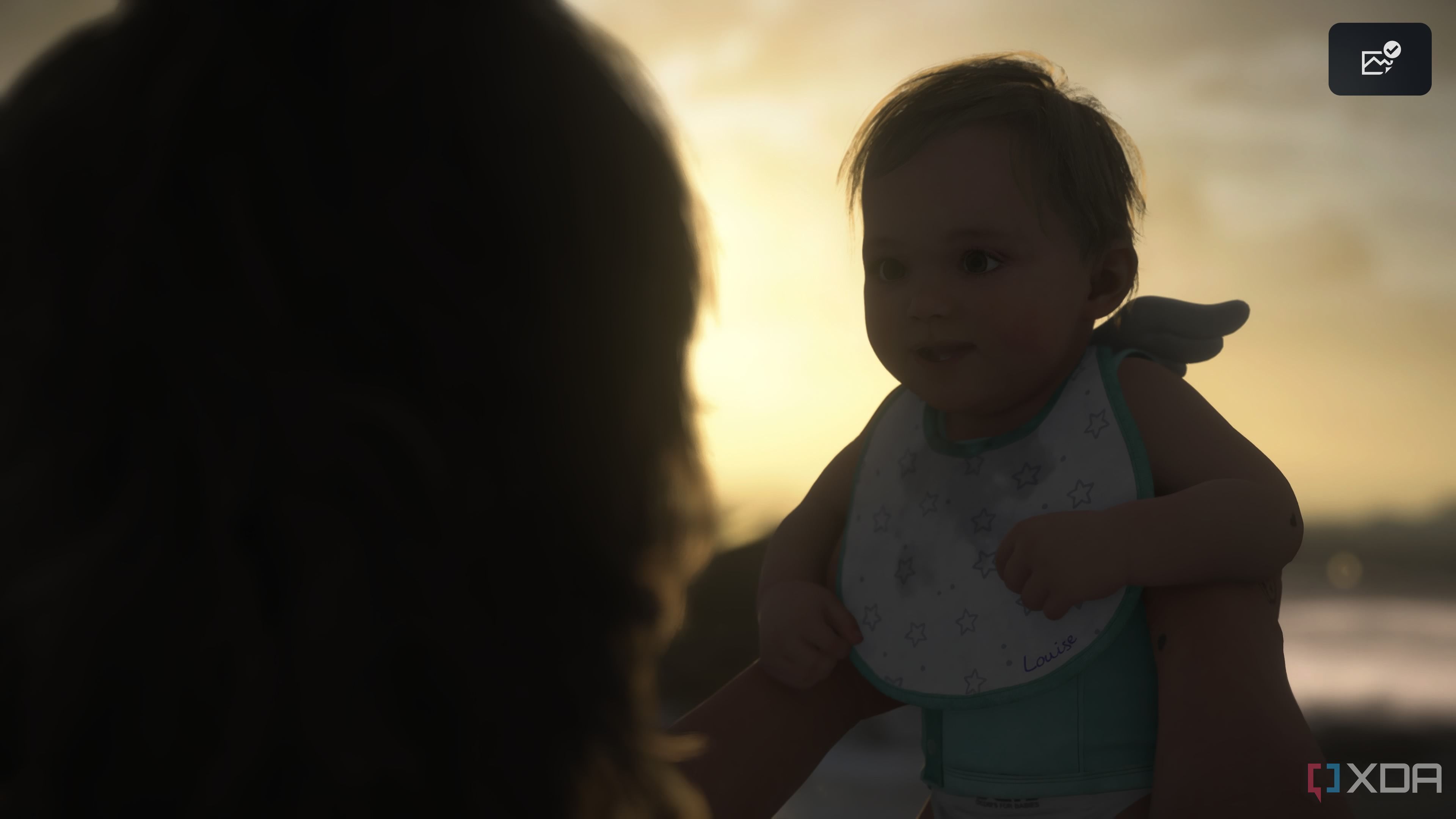 Baby Lou and Sam on the beach in Death Stranding 2.