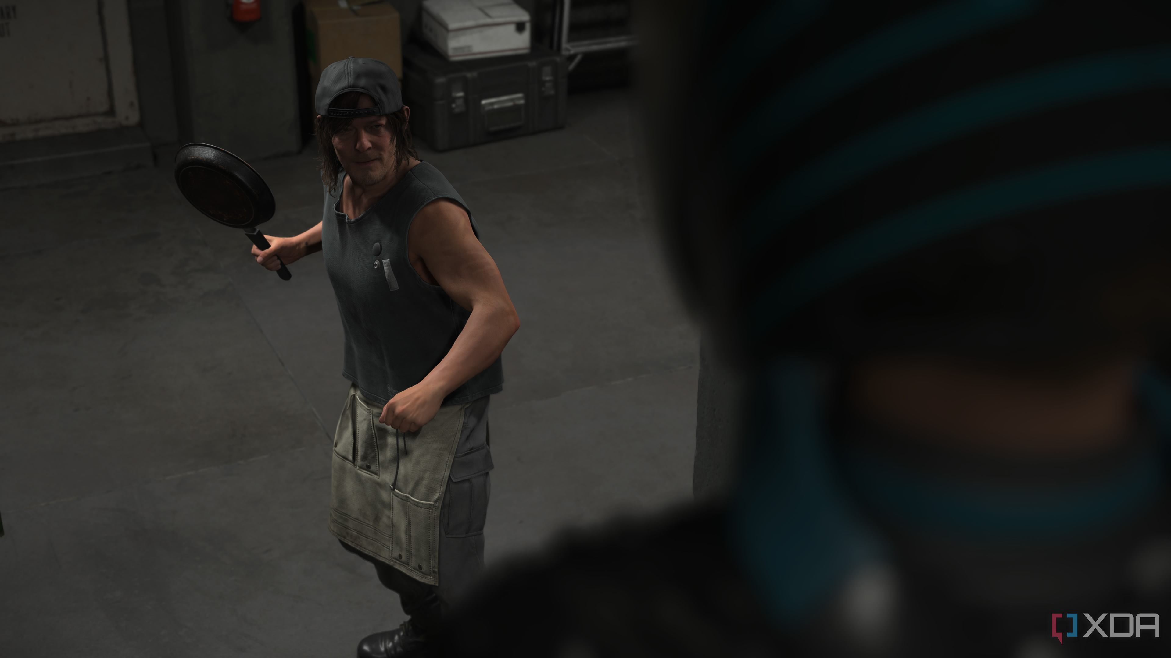 Sam holding a fying pan in Death Stranding 2.