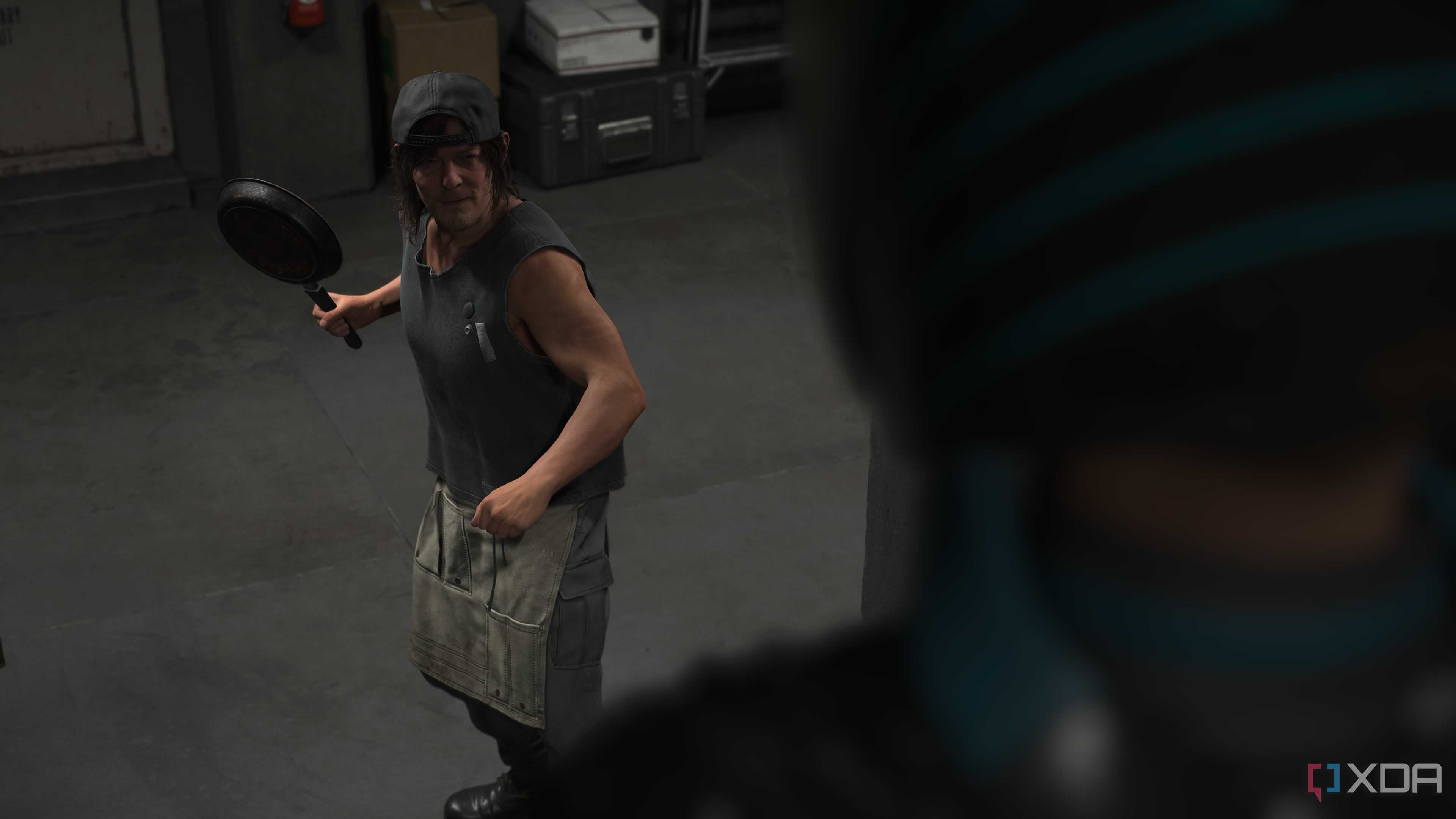 Sam holding a fying pan in Death Stranding 2.