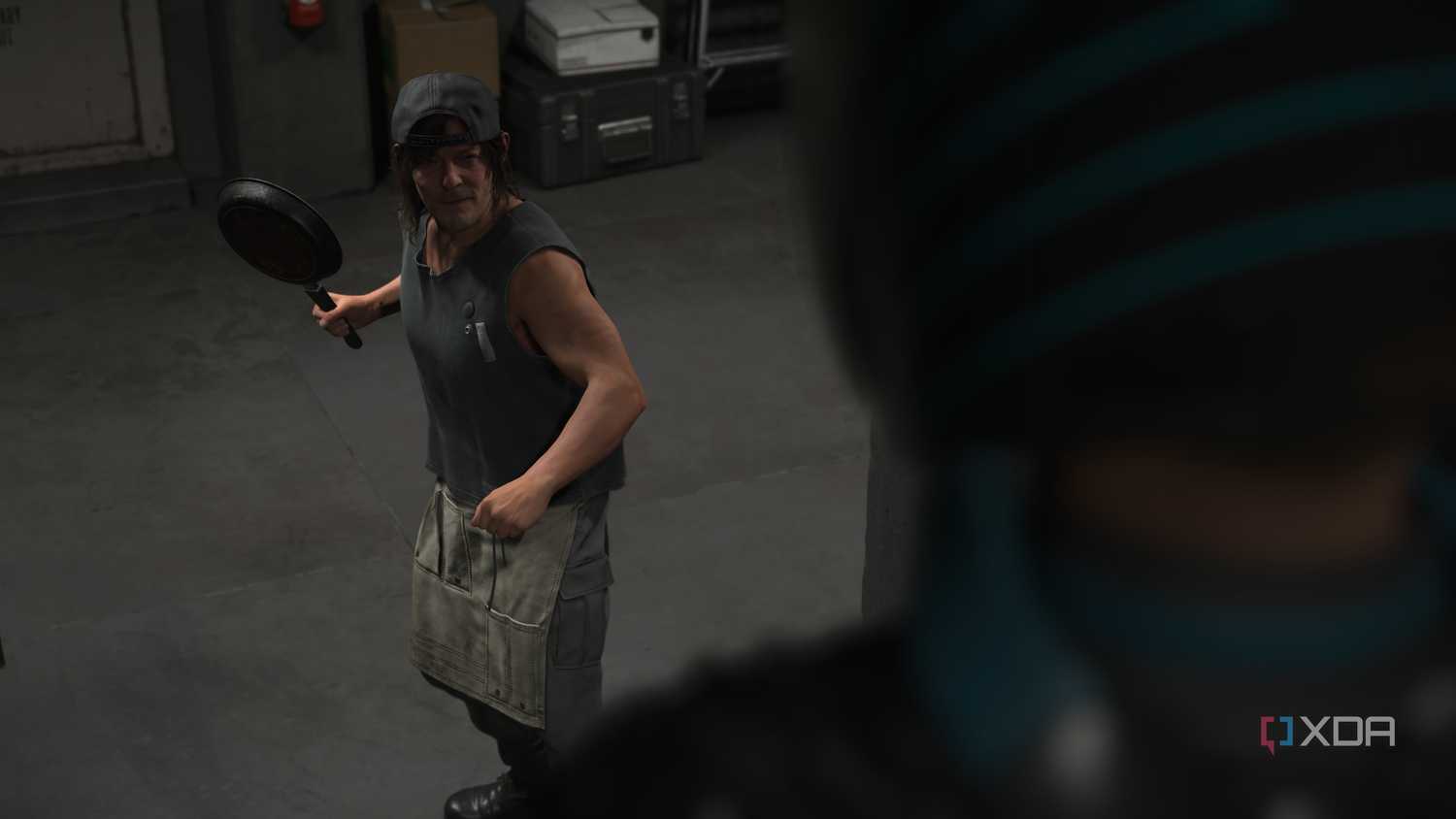Sam holding a fying pan in Death Stranding 2.