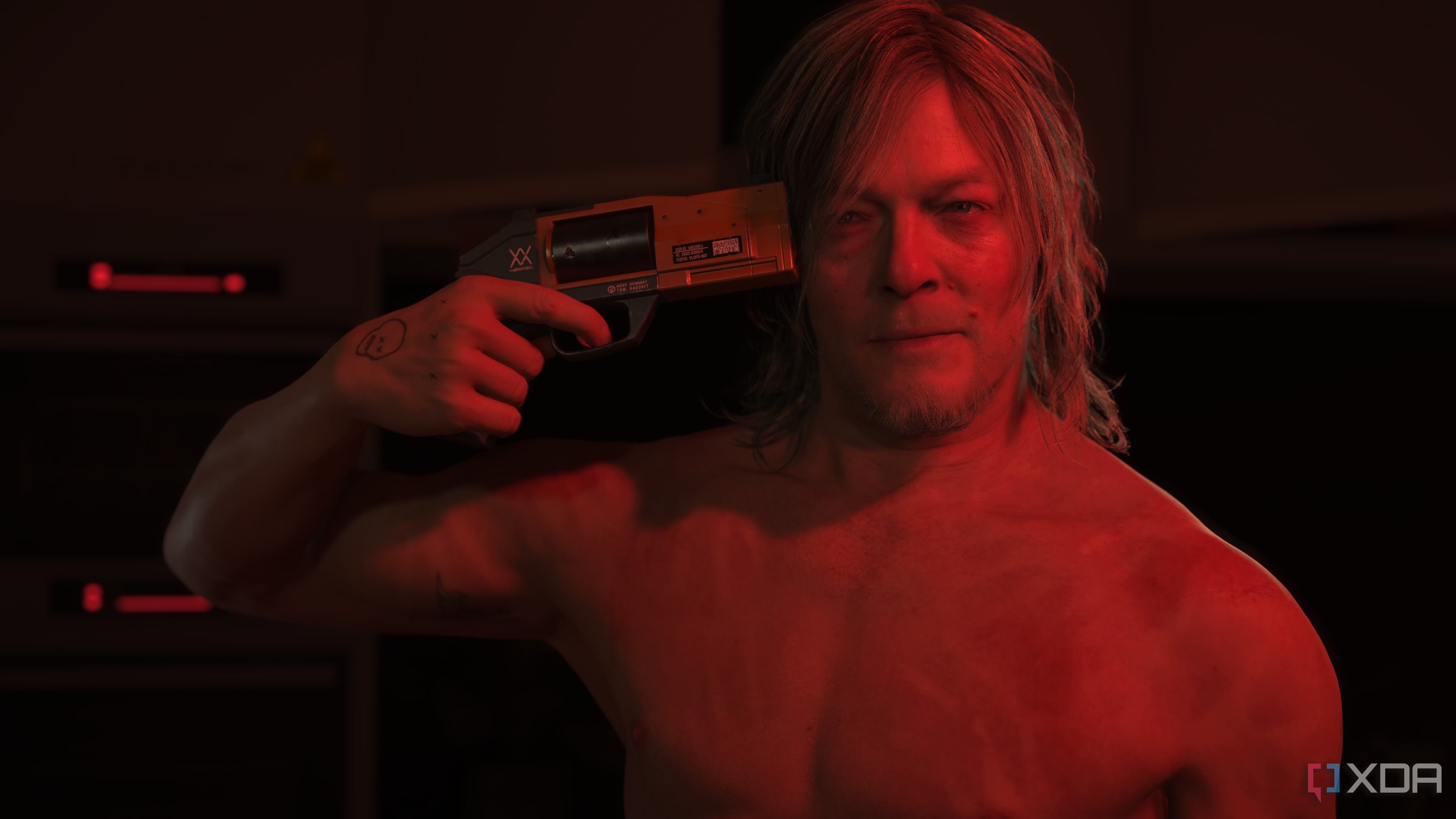 Sam Porter Bridges holding a gun to his own head.