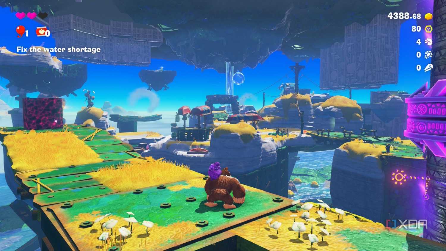 A screenshot of DK exploring a new location in Donkey Kong Bananza
