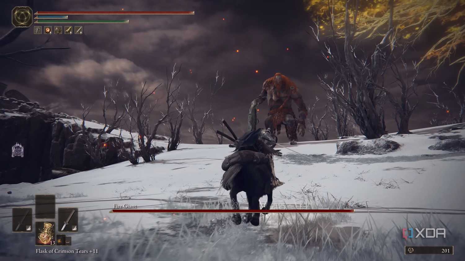 The Fire Giant boss fight in Elden Ring.