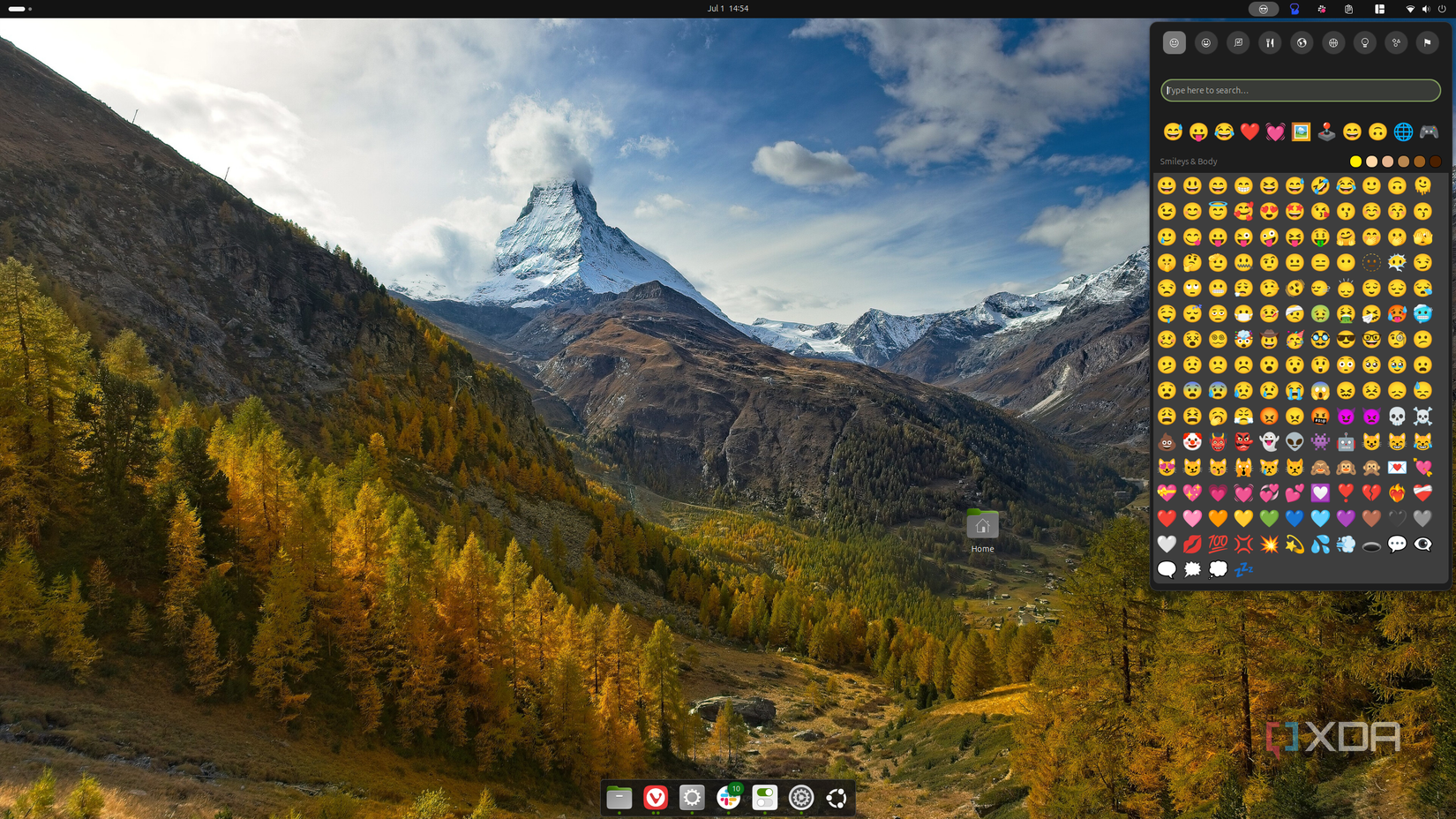 Screenshot of Ubuntu showing an emoji panel powered by Emoji copy