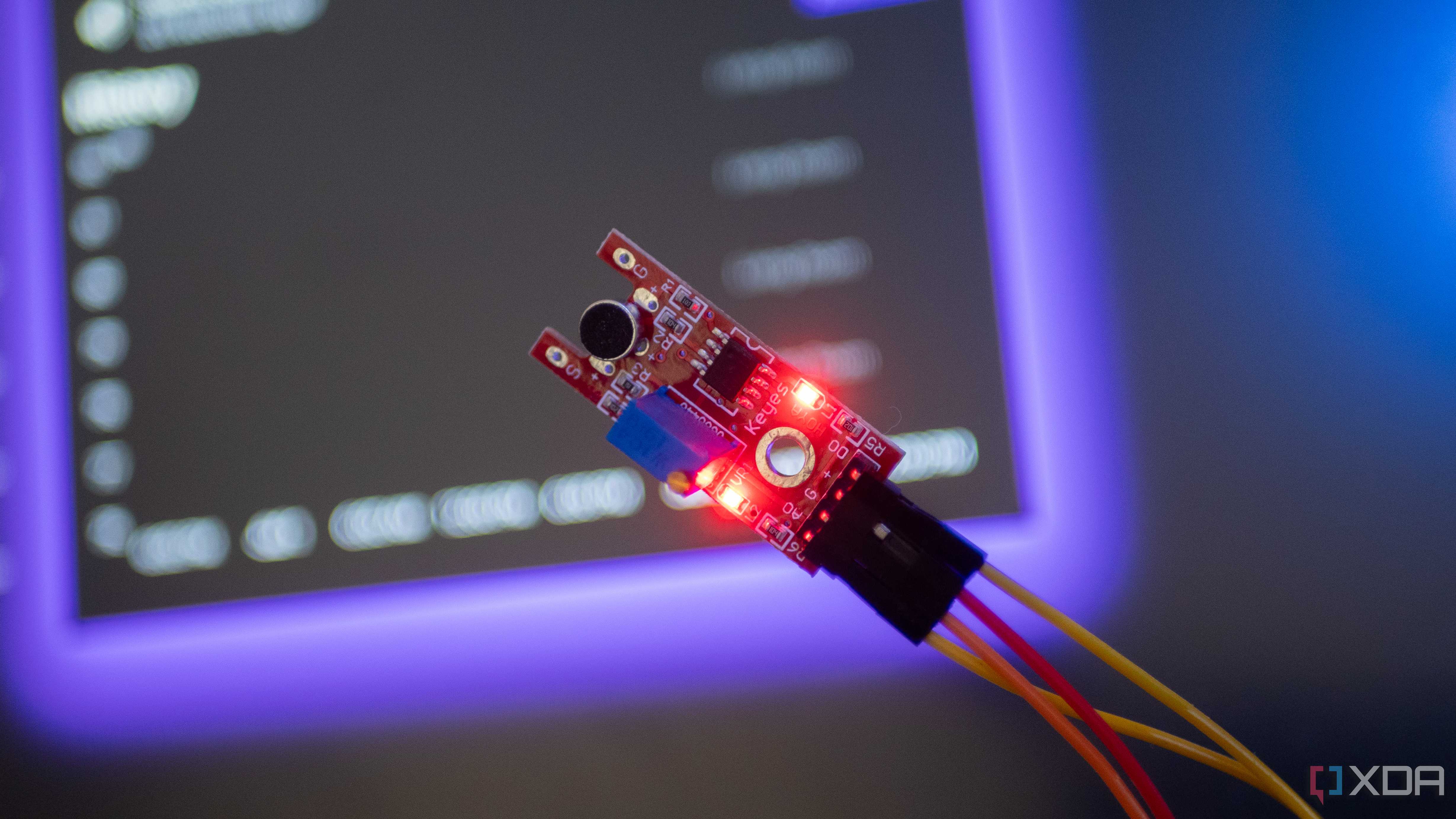ESP32 connected to a sound sensor, with Home Assistant in the background