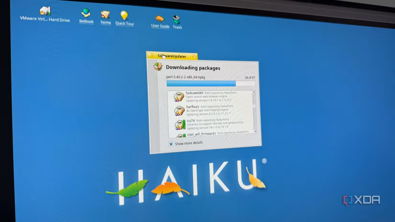 A photo of a computer downloading packages for Haiku