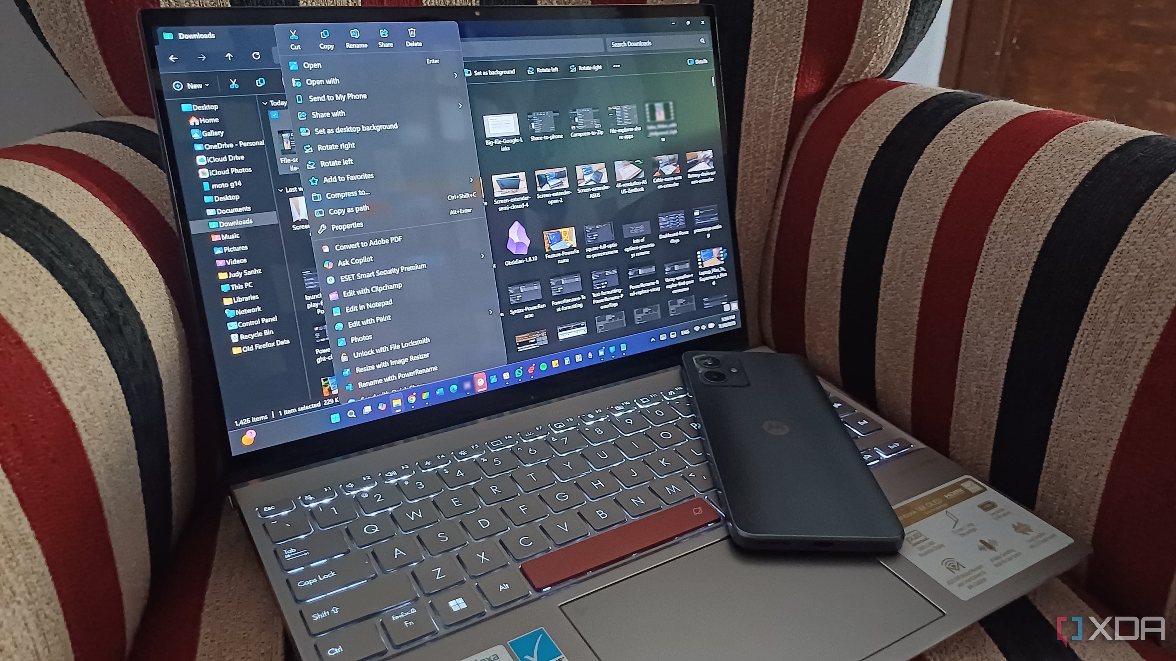 Laptop with File Explorer open on chair