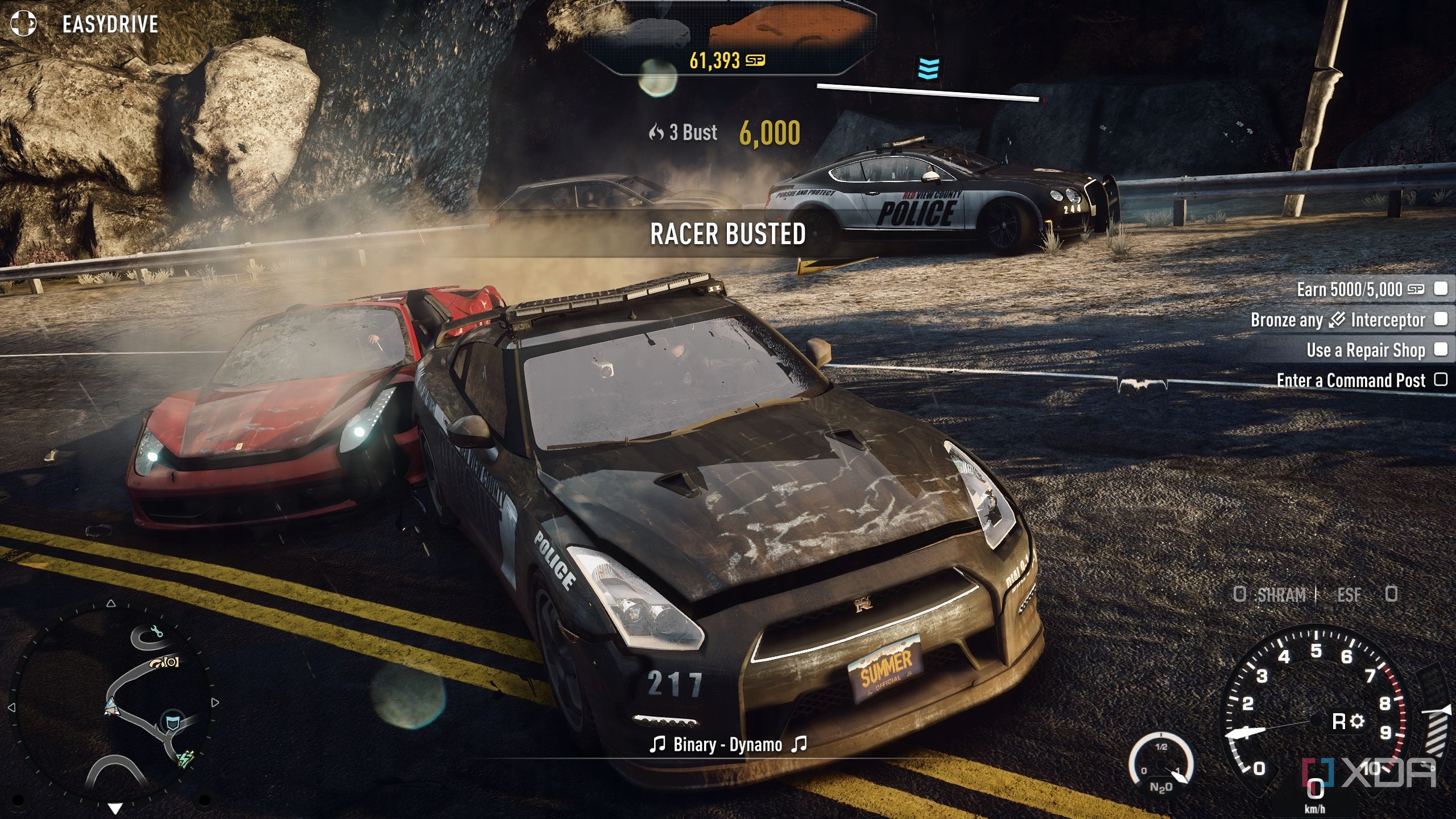 A police Nissan GTR apprehending a racer in a red Ferrari in NFS Rivals.