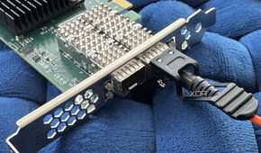 Optical Direct Attach Copper cable plugged into a SPF+ PCI Express adapter