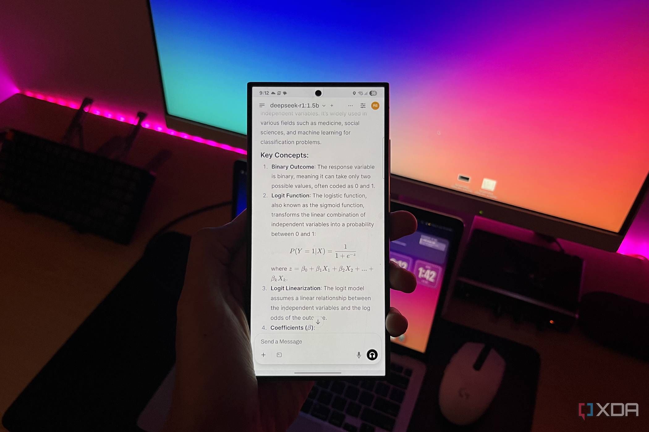 A person holding a Samsung Galaxy S24 Ultra running DeepSeek-R1 via Open WebUI