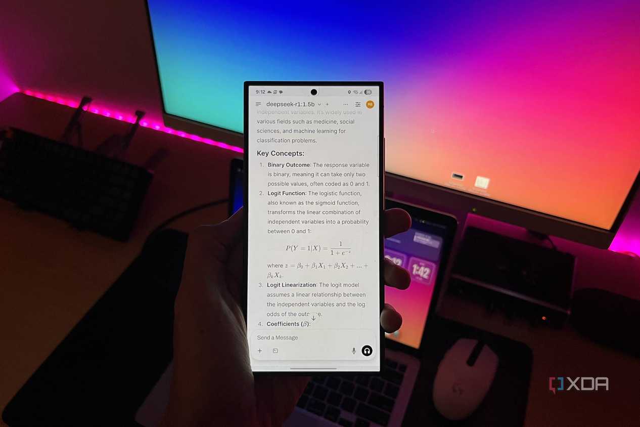 A person holding a Samsung Galaxy S24 Ultra running DeepSeek-R1 via Open WebUI