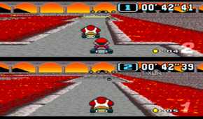 Split-screen racing in Bowser Castle in Super Mario Kart on the SNES.