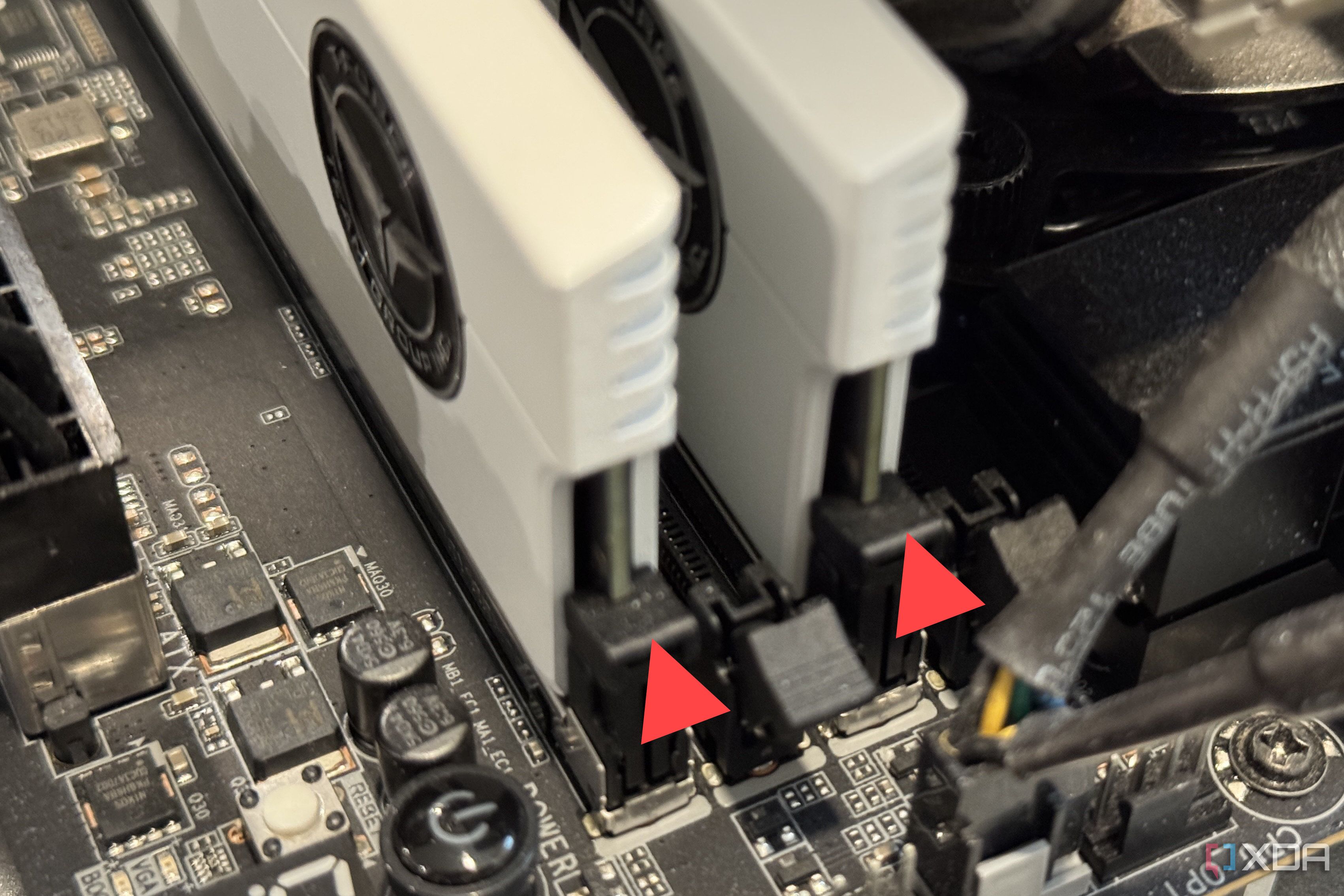 two ddr5 modules mounted in a2 and b2 slots with red arrows pointing to them