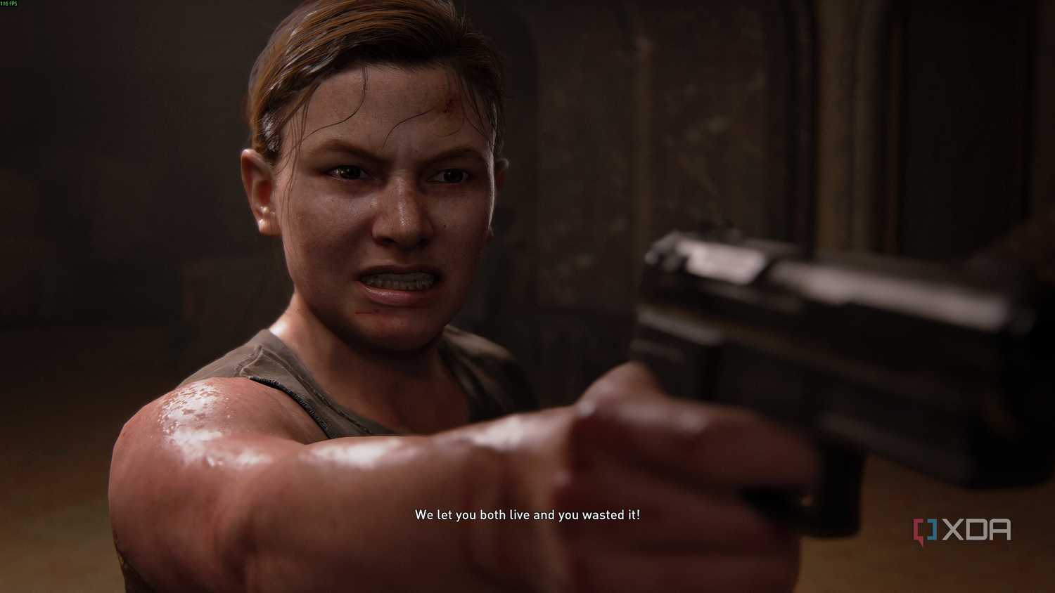 Abby pointing a gun angrily in The Last of Us Part II.