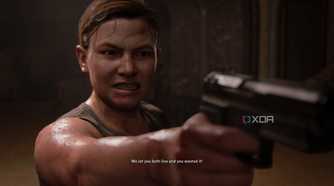 Abby pointing a gun angrily in The Last of Us Part II.
