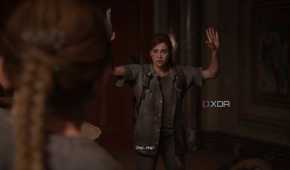Abby holding Ellie at gunpoint in The Last of Us Part II.