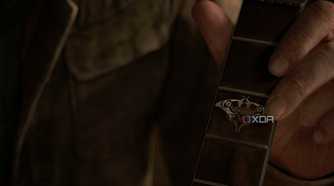 Joel holding a guitar in The Last of Us Part II.