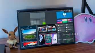 A monitor showing an Ubuntu desktop with various windows arranged using Tiling Shell