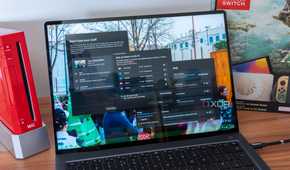 A Windows 11 laptop showing Windows backup and OneDrive backup options