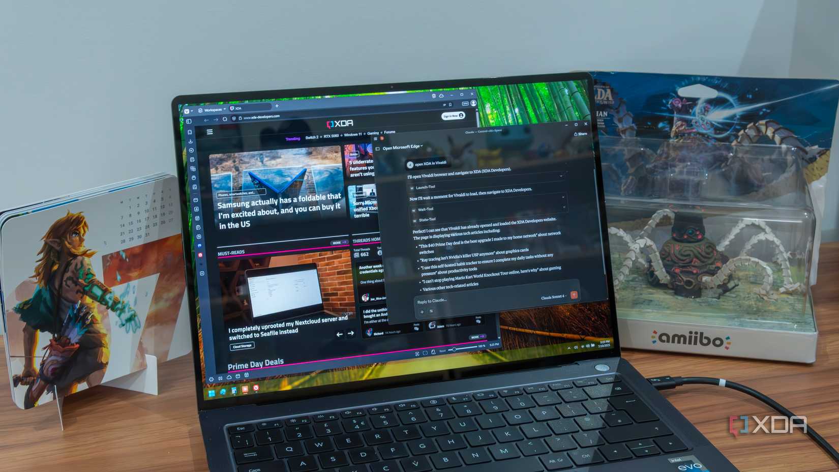A Windows 11 laptop running Claude and Vivaldi, which has a website open following a command from Claude