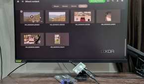 photo of windows pc next to raspberry pi running emby