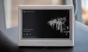 XIAO ePaper Panel running TRMNL, showing a Spotify media player