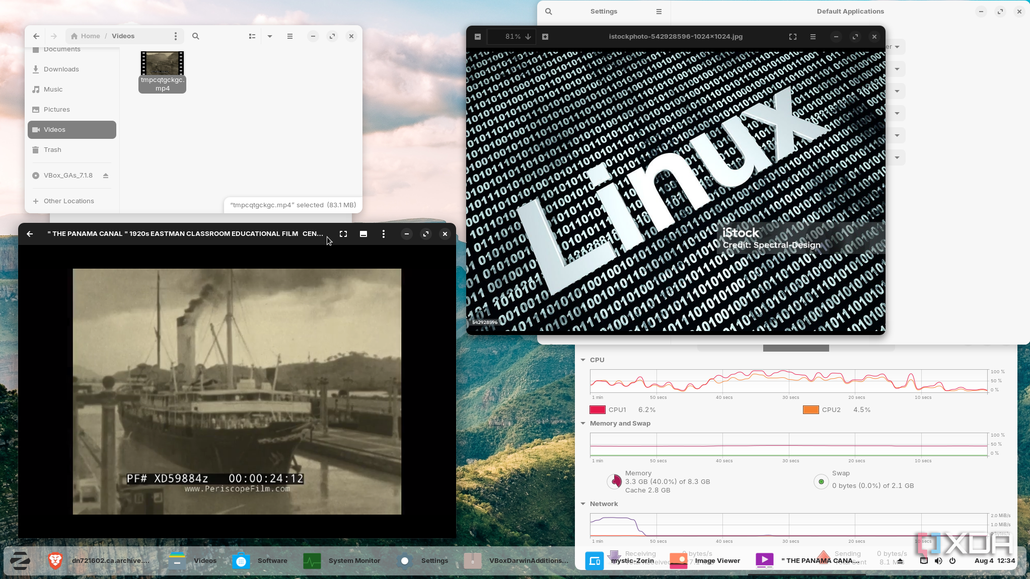Shows Zorin OS running Media video and photos