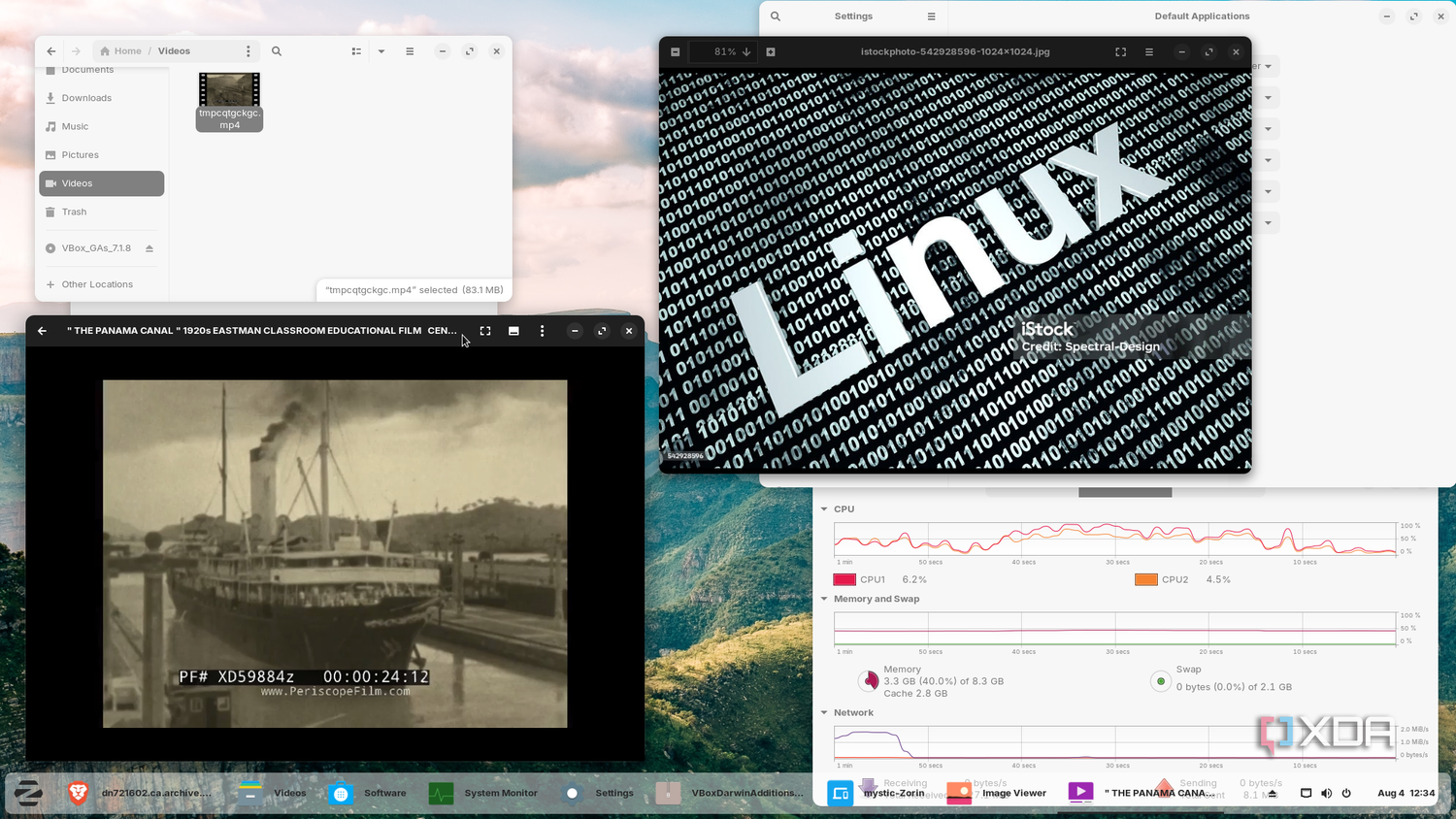 Shows Zorin OS running Media video and photos
