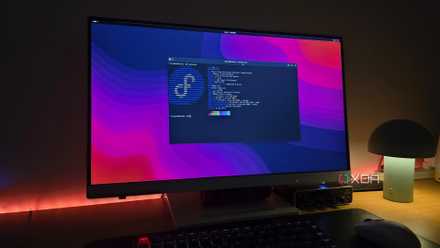 A computer running Fedora Silverblue is connected to the monitor