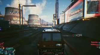 Driving a van in Cyberpunk 2077.