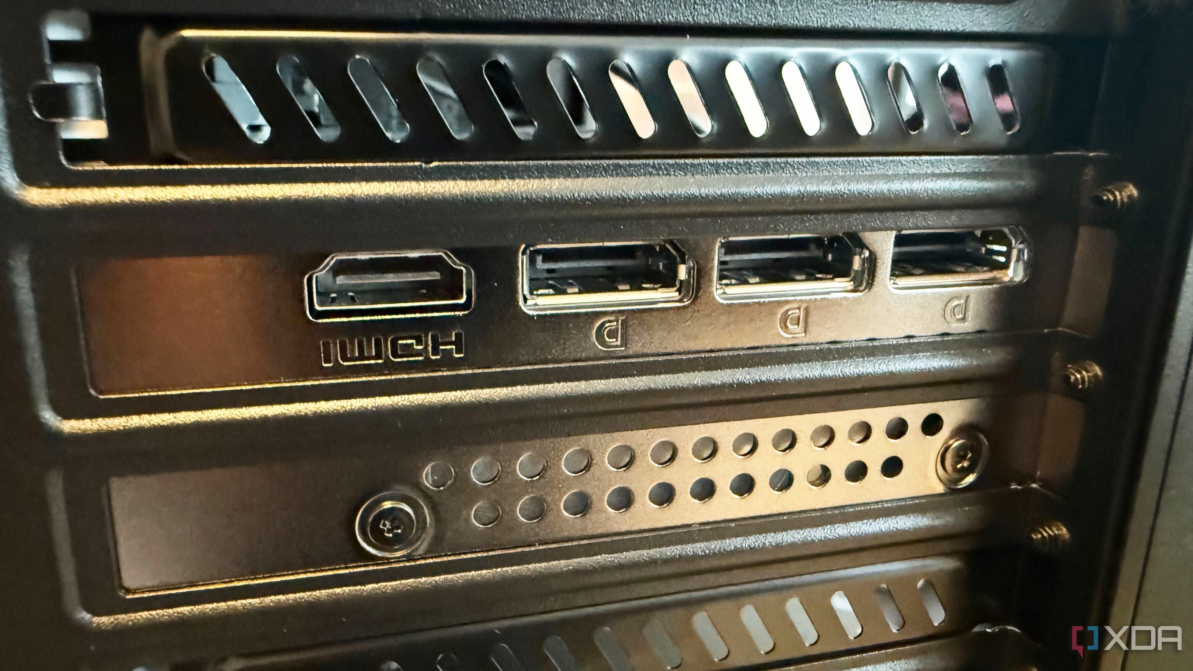 HDMI and DisplayPort ports on the back of a desktop tower.
