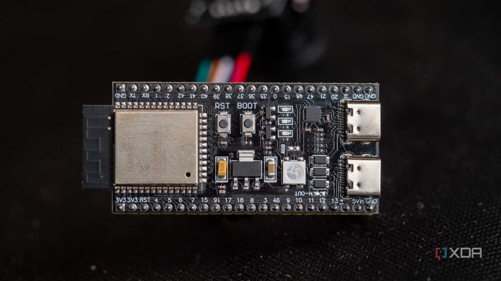 The front of the ESP32-S3, with a connected joystick behind it