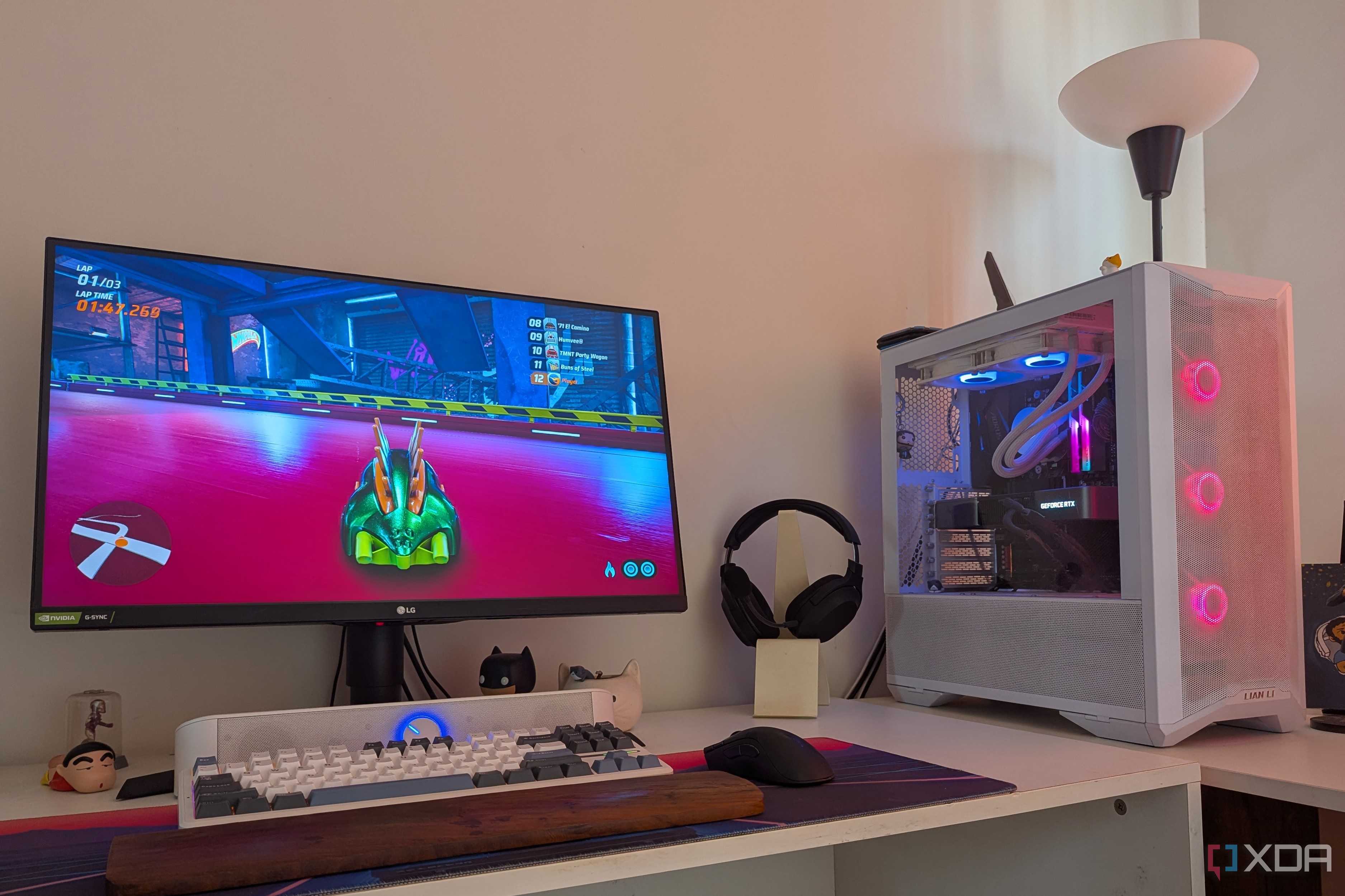 A gaming PC showing RGB lighting synced with the scene on the monitor