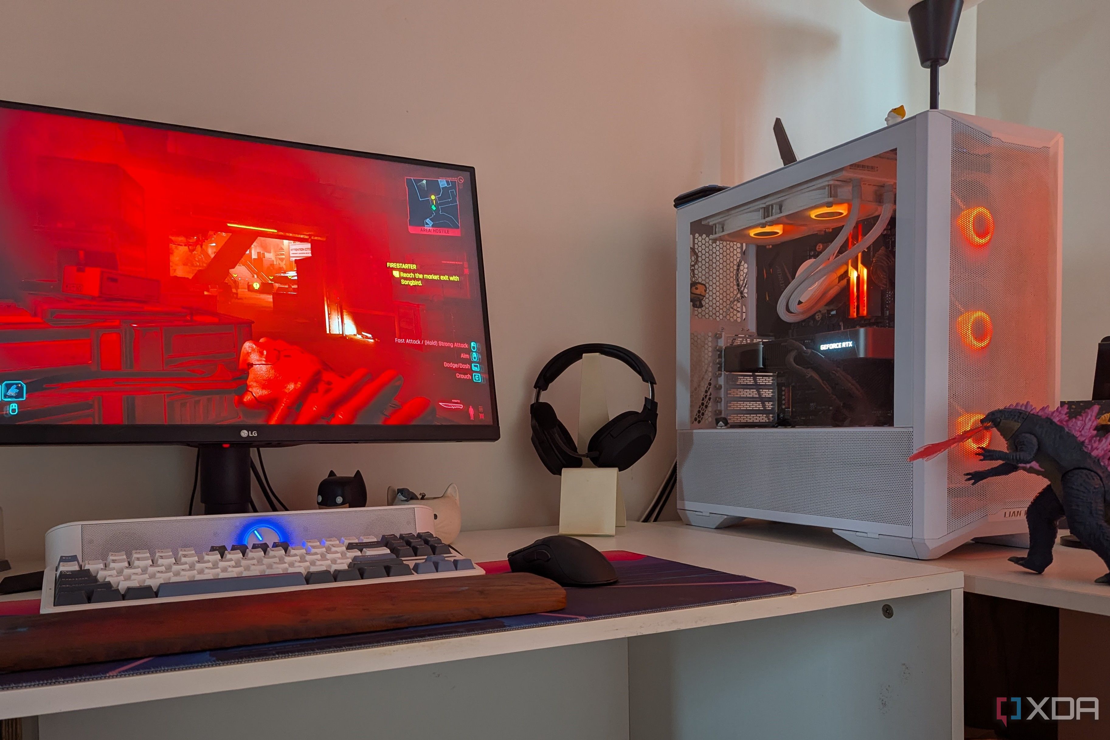 A gaming PC showing RGB lighting synced with the scene on the monitor