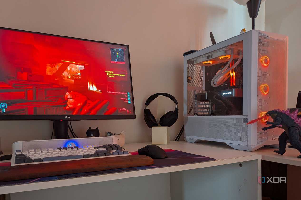 A gaming PC showing RGB lighting synced with the scene on the monitor