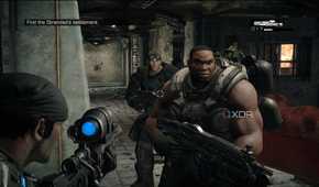A screenshot of Marcus look at Cole and Baird in Gears of War: Reloaded
