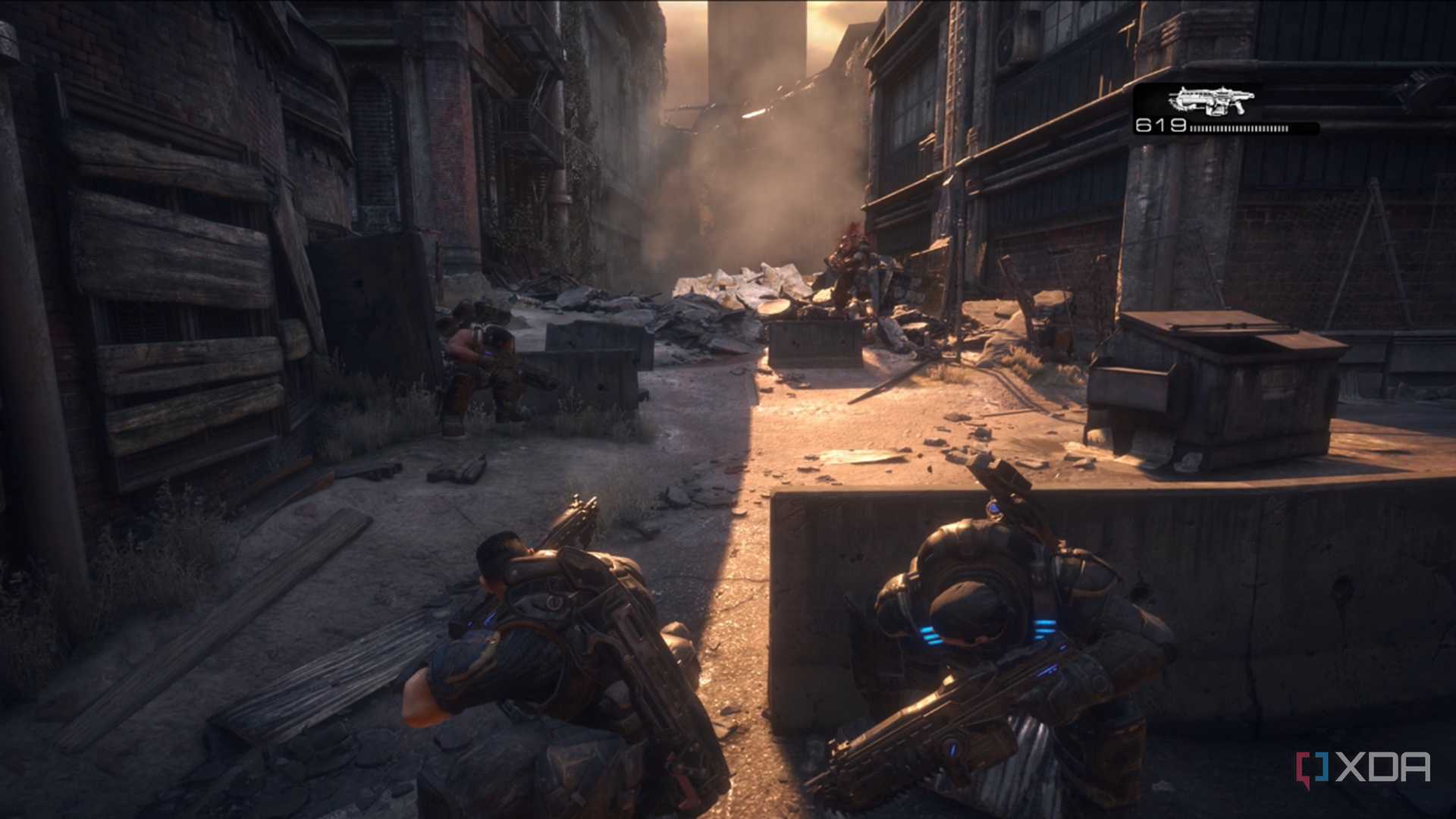 A screenshot of Dom and Marcus facing an emergence hole in Gears of War: Reloaded