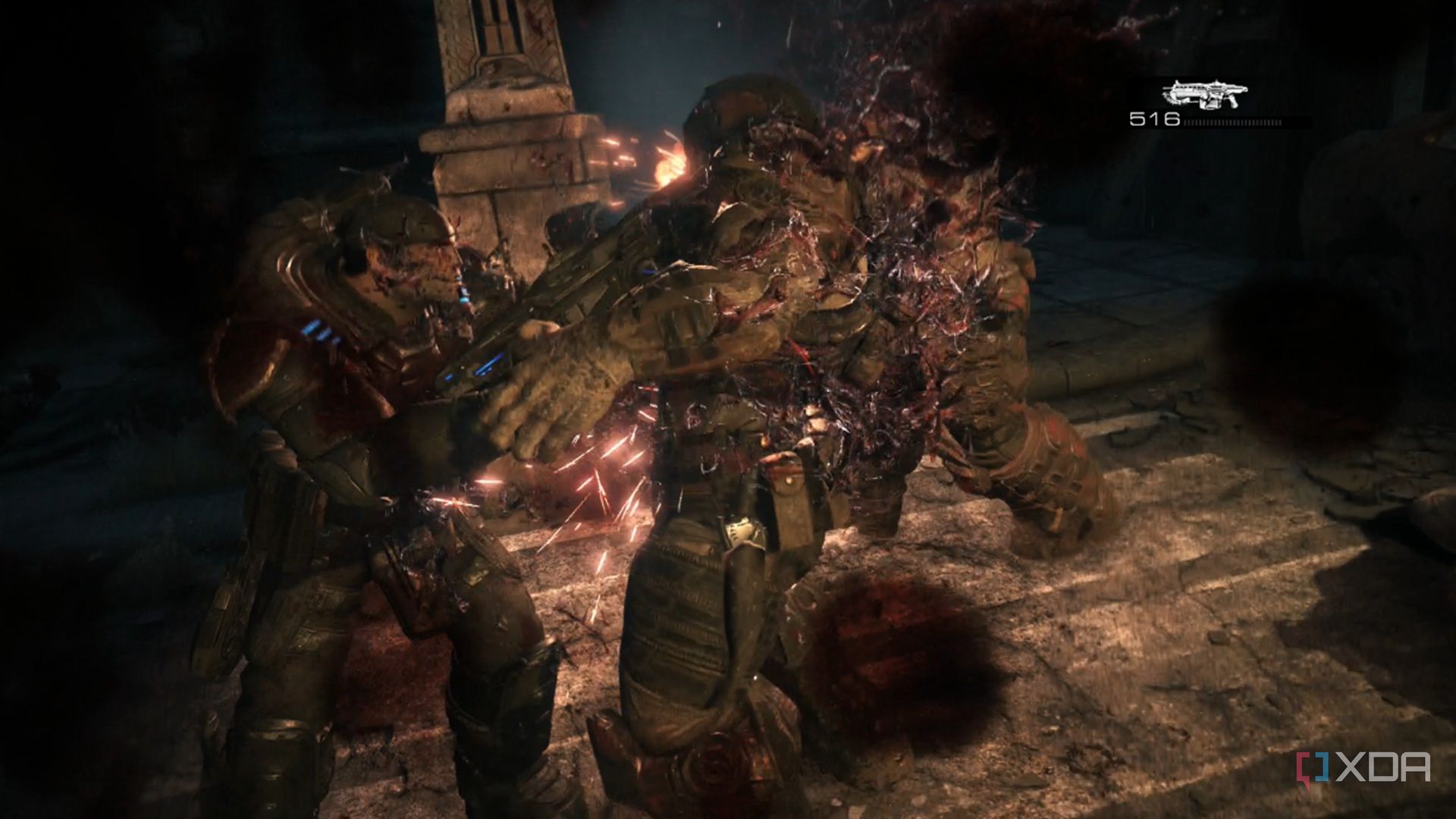 A screenshot of Marcus using a lancer in Gears of War: Reloaded