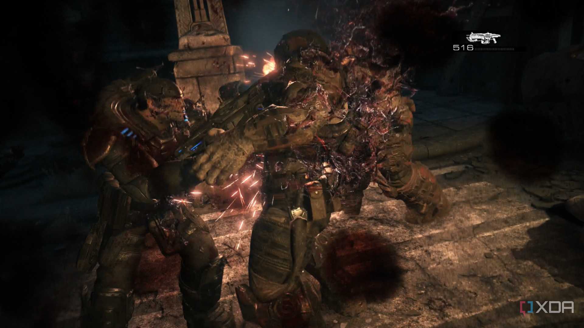 A screenshot of Marcus using a lancer in Gears of War: Reloaded