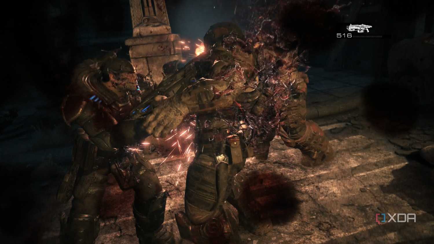A screenshot of Marcus using a lancer in Gears of War: Reloaded