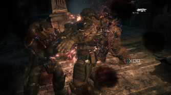 A screenshot of Marcus using a lancer in Gears of War: Reloaded