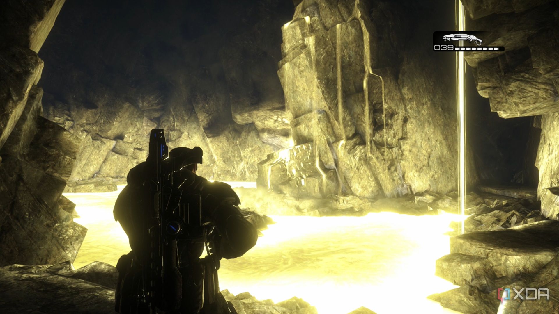 A screenshot of Marcus looking at the underground emulsion in Gears of War: Reloaded