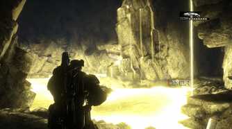 A screenshot of Marcus looking at the underground emulsion in Gears of War: Reloaded