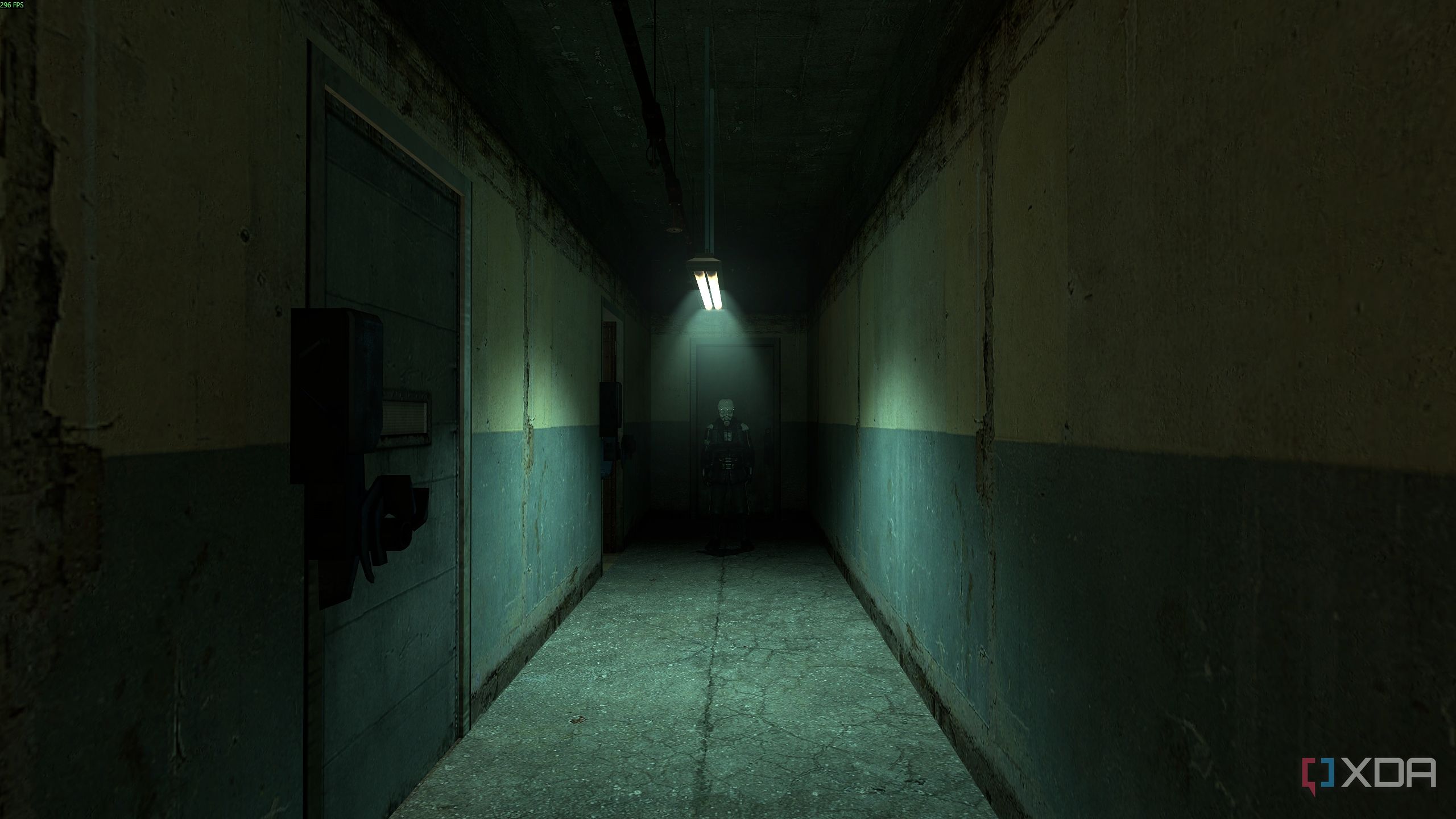 A dimly lit corridor in Half-Life 2.