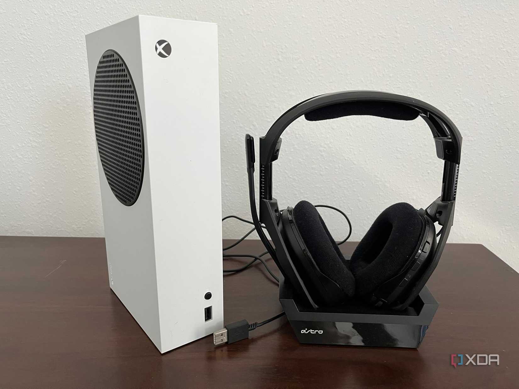 A shot of an Astro Gaming A50 headset with an Xbox console