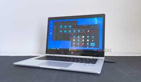 photo of a 2017 HP Elitebook x360 1030 G2 running Fedora Linux with the Cinnamon desktop environment