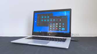 photo of a 2017 HP Elitebook x360 1030 G2 running Fedora Linux with the Cinnamon desktop environment